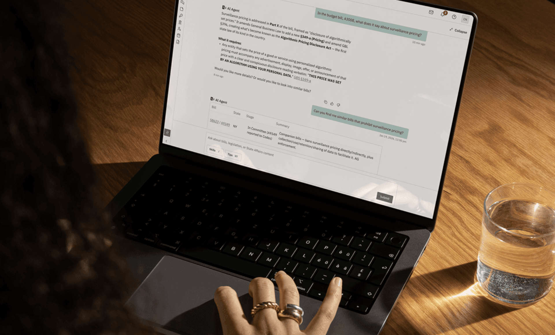 A policy professional reviewing the State Affairs intelligence dashboard on a laptop